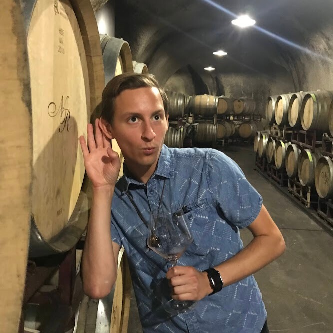 Listening to wine in a barrel