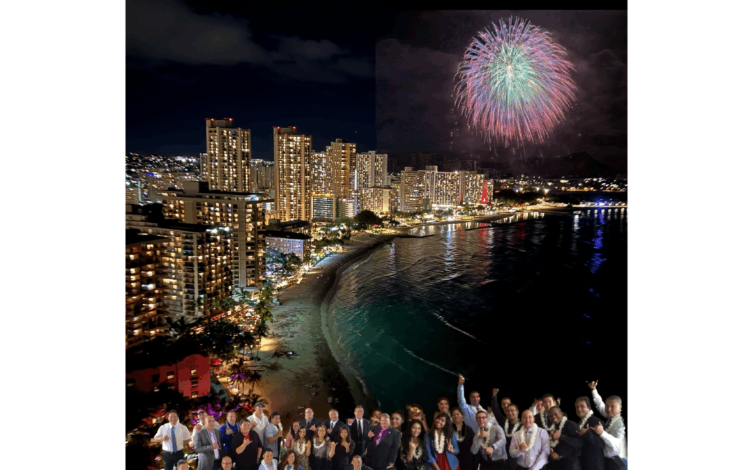 Group of people wearing leis celebrating along Waikiki Beach at night with city lights and fireworks over Honolulu, representing Platypus Perks travel experiences in Hawaii.
