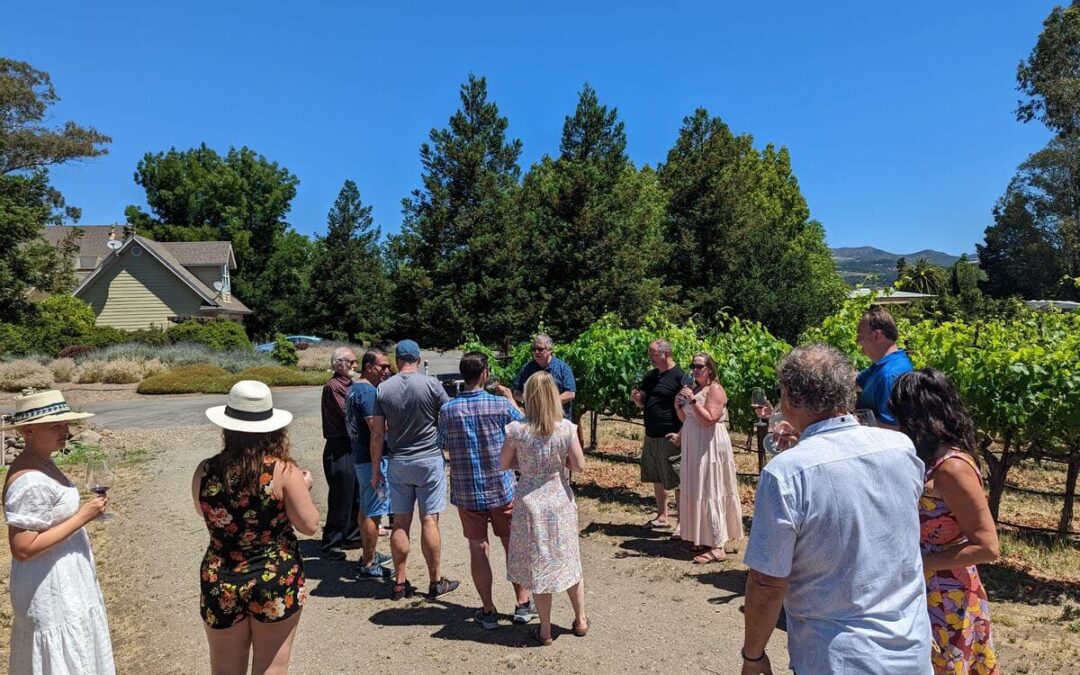 group of people in vineyard