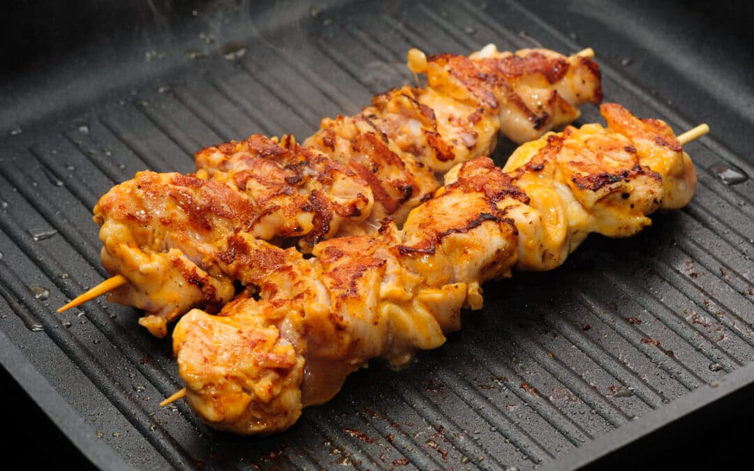 chicken skewers on the grill