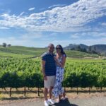 Couple enjoying a private wine tour with vineyard views in Napa Valley