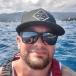 Platypus Tours curator Dustin kayaking off the coast of Portofino, Italy, on the Mediterranean Sea.